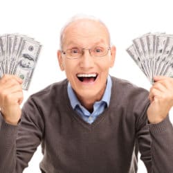 Picture of mature man holding cash