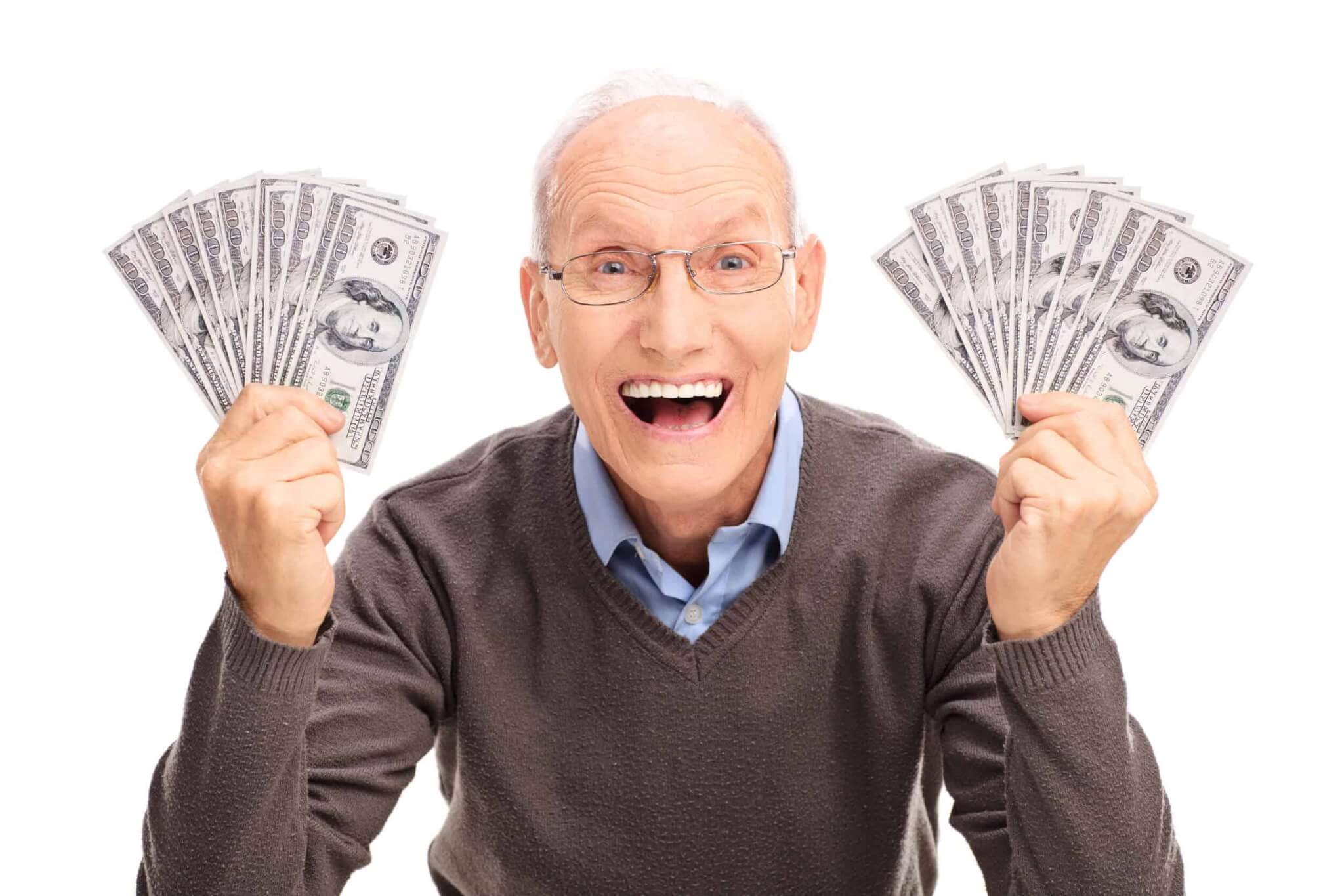 Picture of mature man holding cash